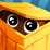 Dragon Box Algebra 12+ icon featuring a yellow cartoony box slighty open with a pair of eyes peeking out