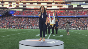 Jennifer Caraluzzi performs the National Anthem at a New England Patriots game