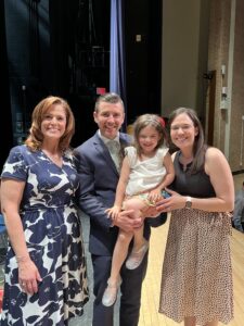 (l-r): Dr. Kristy Zaleta, Brian Betesh and his family at the Danbury Teacher of the Year award ceremony.